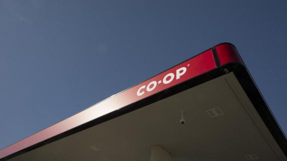 Co-op Gas Bar canopy against a blue sky